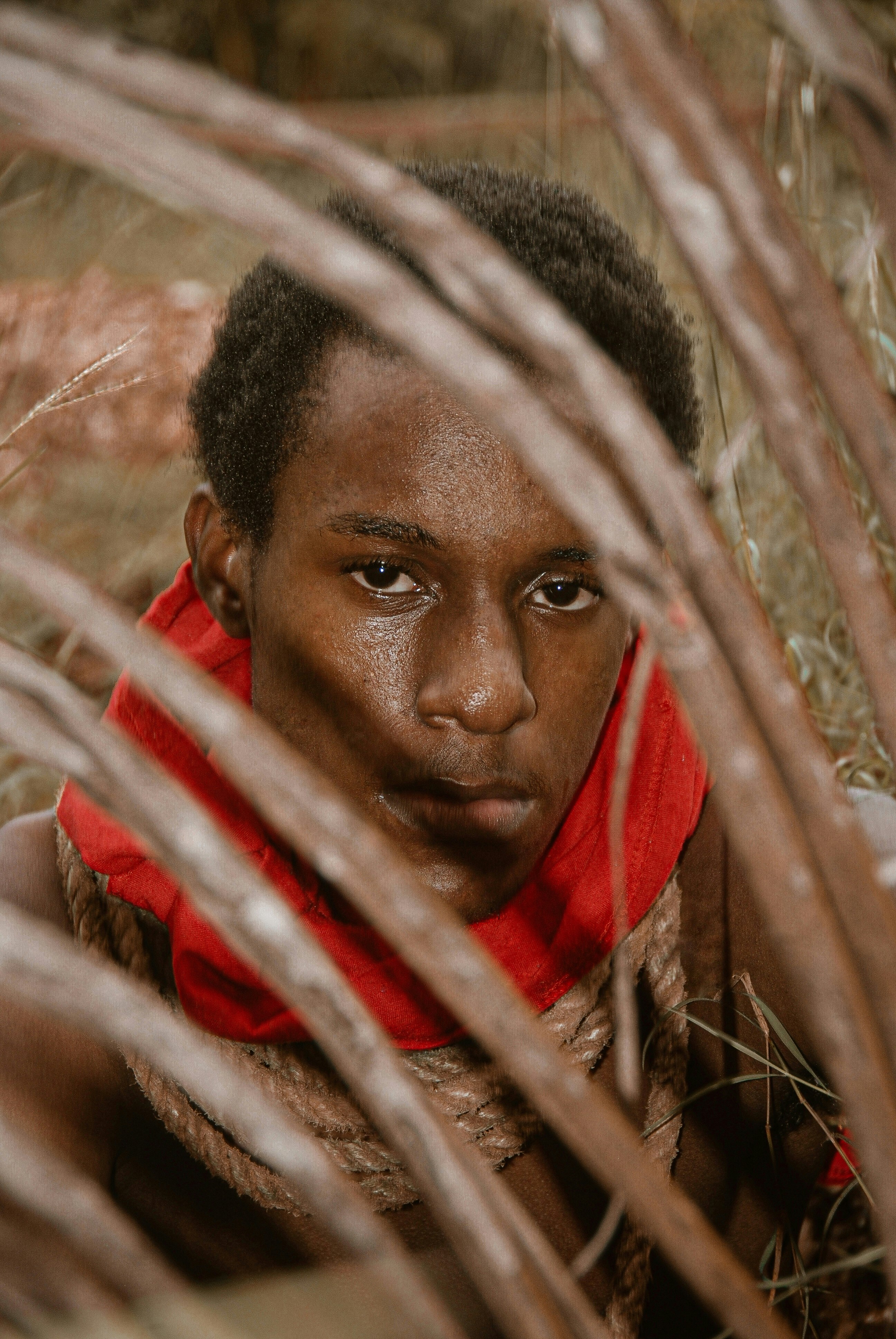 man in red and white scarf